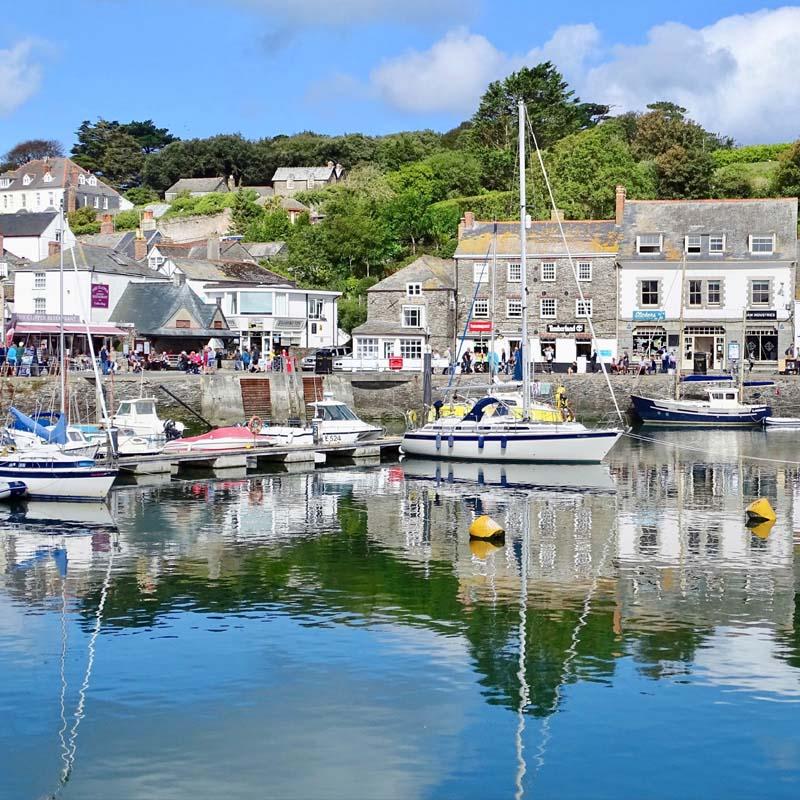Padstow's working fishing harbour with moored boats, North Cornwall